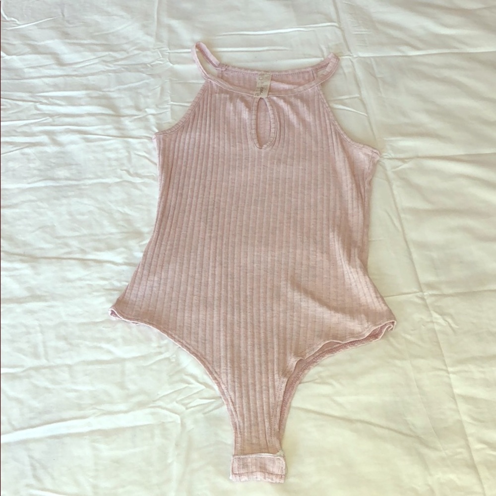 Pink bodysuit with peep hole